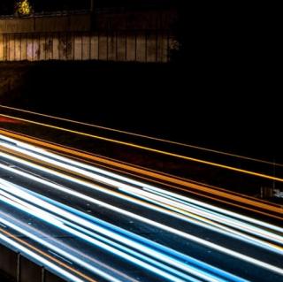 Car lights on long exposure at night